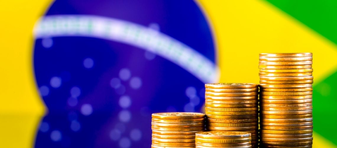 A,Stack,Of,Gold,Coins,On,The,Background,Of,The