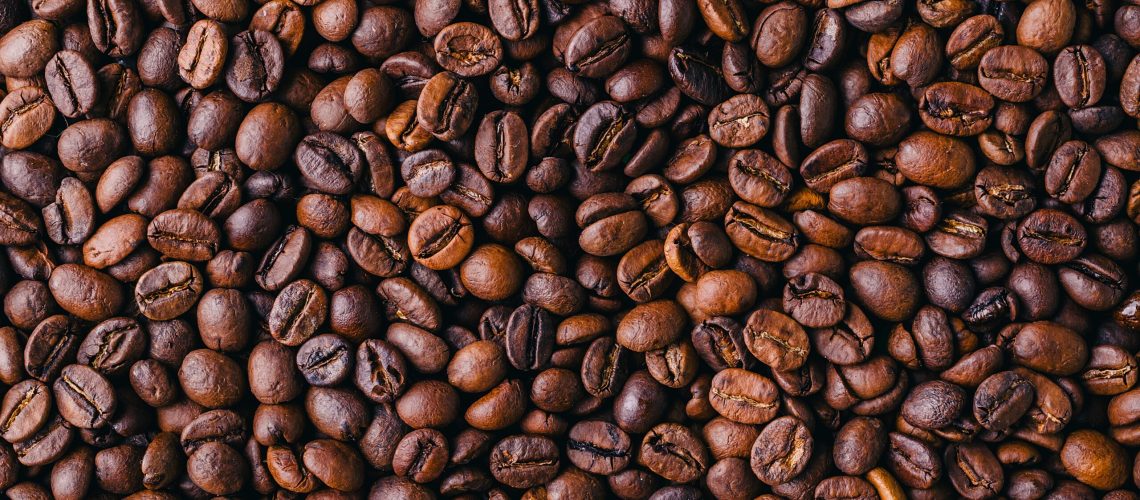 A background of roasted fresh brown coffee beans - perfect for a cool wallpaper